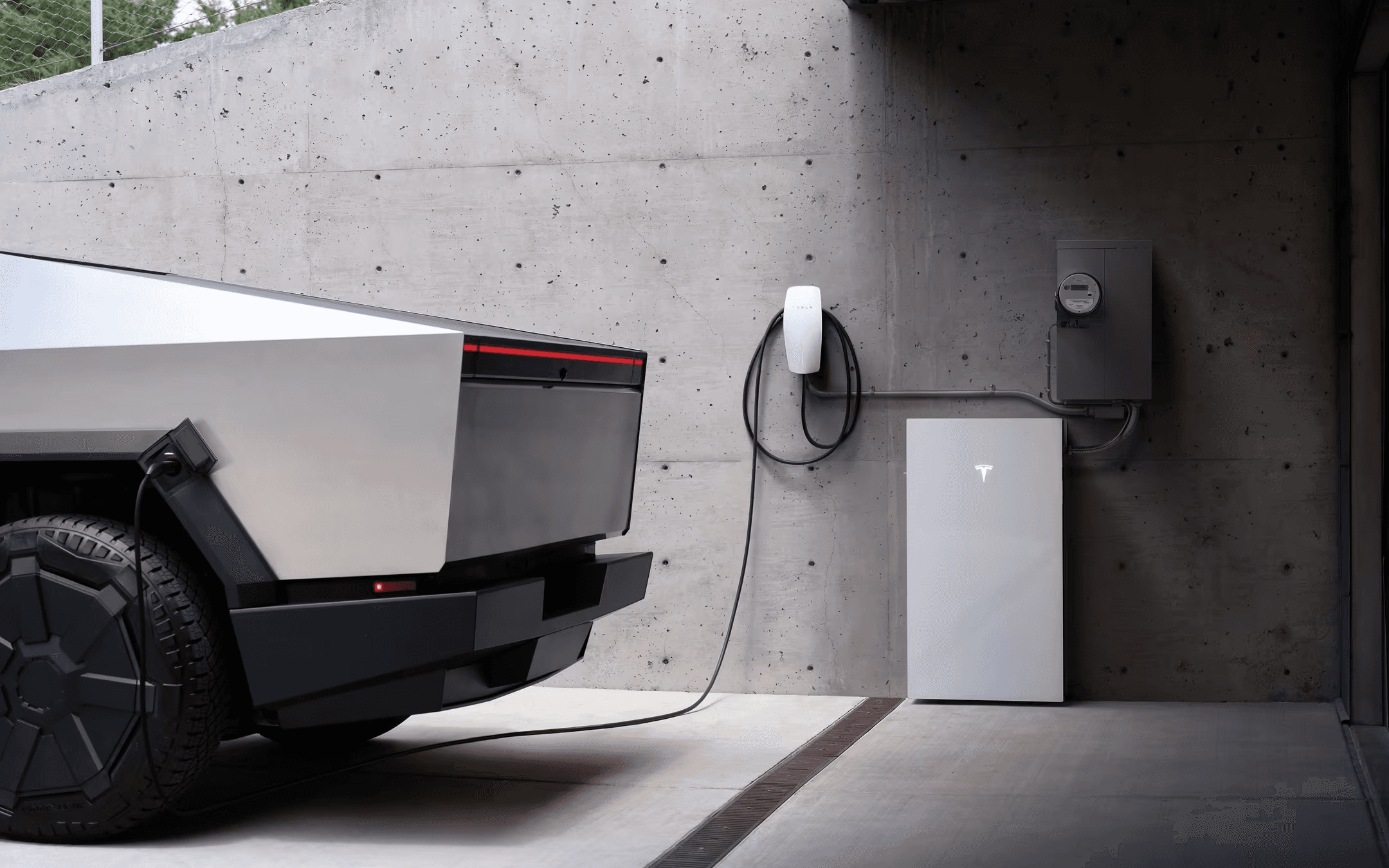 Tesla vehicle charging at home using a Wall Connector and home battery system